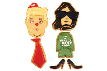 Portrait caricature de Donald et Melania Trump en biscuits. La tête de Donald a une mini casquette maga sur ses gros cheveux et un née de clown et une grosse cravate rouge, Mélania Trump a d'immenses lunettes noire. Il y a aussi un manteau I really don't care et deux souliers Louboutin. 6 biscuits au total.